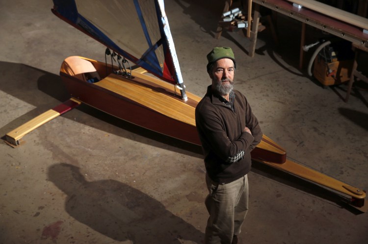 Bill Buchholz builds ice boats in his cavernous, still-unfinished boat shop in his Camden woods shop. These days he focuses more on custom-made ice boats, like the mini skeeter that was developed four years ago.