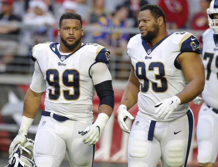 Los Angeles defensive ends Aaron Donald, left, and Ndamukong Suh will provide a big challenge for the Patriots. (Associated Press/Rick Scuteri)