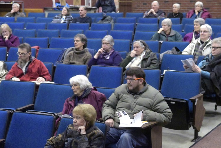 People listen on Sunday to a discussion about the Second Amendment during a forum at the University of Maine at Augusta.