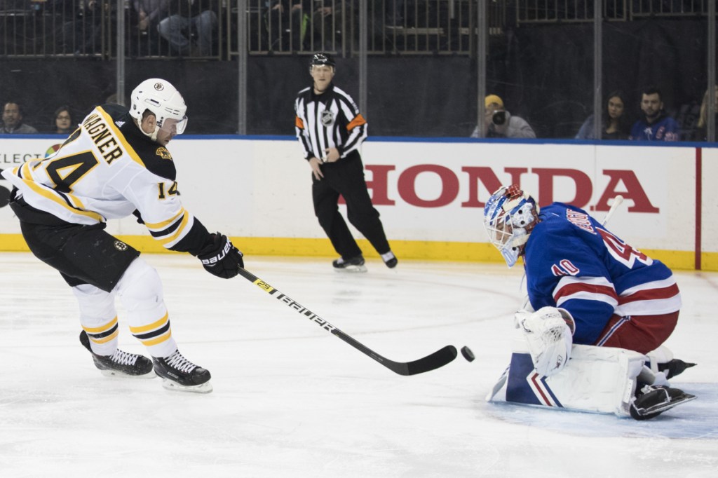 Rangers goalie Alexandar Georgiev makes a save against Boston's Chris Wagner during Wednesday's game at Madison Square Garden.