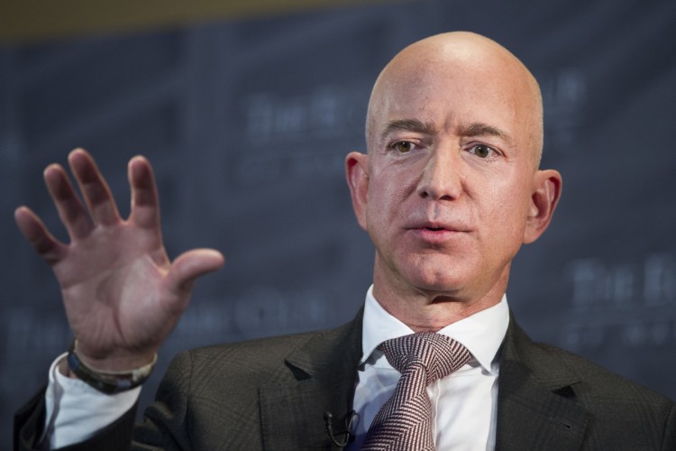 Jeff Bezos, Amazon founder and CEO, who also owns The Washington Post, says the National Enquirer threatened to publish revealing photographs of him unless his private investigators backed off the tabloid and Bezos released a statement saying he had no basis for saying the Enquirer's coverage was politically motivated.