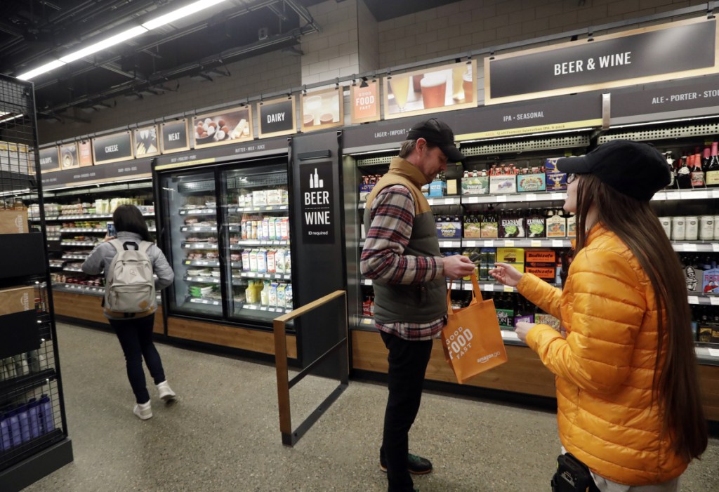 Online giant Amazon has propelled cashier-less technology at its Amazon Go stores, like this one in Seattle. Other merchants are exploring similar methods to allow shoppers to buy without waiting in line.