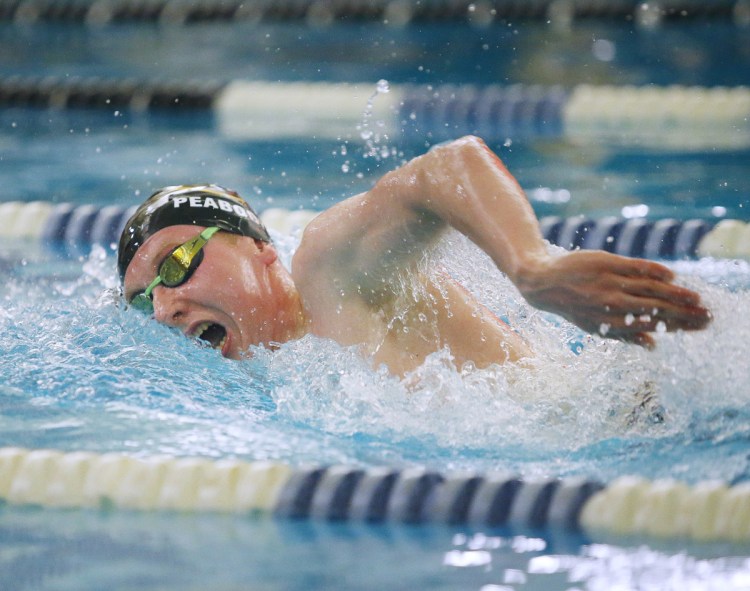 Brim Peabody of Cheverus heads to the finish Friday night on his way to winning the 500-yard freestyle at the North Southwesterns. Peabody also took the 200-yard freestyle and was named the Performer of the Meet.