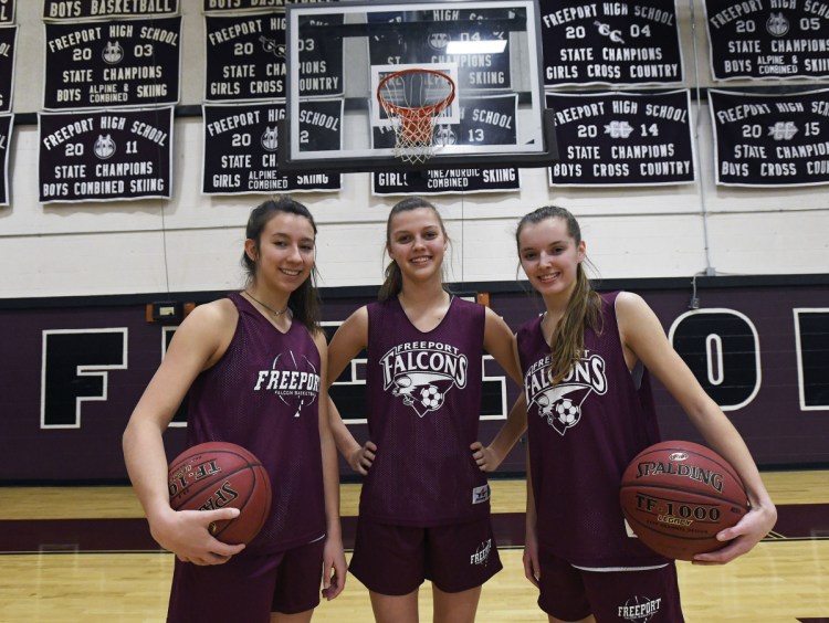 Caroline Smith, left, Rachel Wall and Catriona Gould have led Freeport to a 14-4 record and third place in Class B South as the playoffs begin. Smith is the lone returning starter from last year's team that lost in the regional final.
