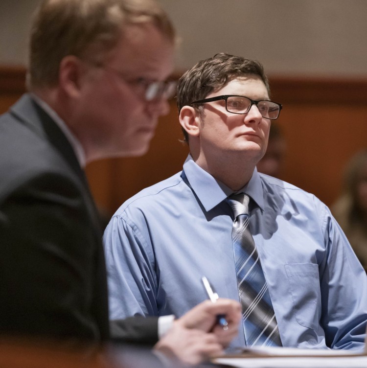 Noah Gaston, right, and his attorney, James Mason, listen during a hearing in Portland on Jan. 22. Gaston admits he shot and killed his wife at their home, but claims he mistook her for an intruder.