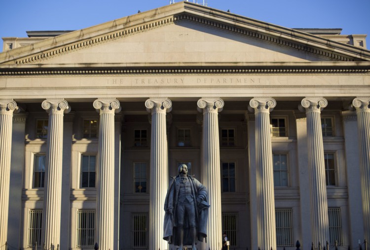 The U.S. Treasury Department building in Washington. The national debt has passed a new milestone, topping $22 trillion for the first time. 