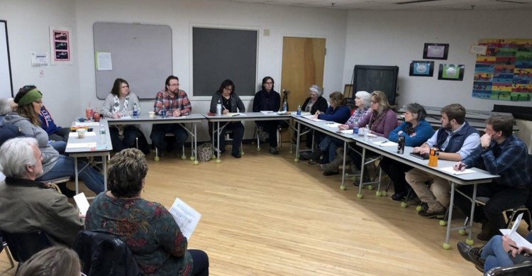 The School Administrative District 75 Board of Directors held an emergency meeting in Topsham Wednesday to discuss leadership issues following the resignation last week of two longtime members. Kim Totten, second from right at the far table, is the panel's chairwoman.