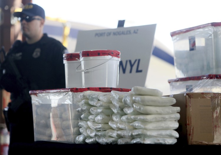 A display of fentanyl and meth that was seized by Customs and Border Protection officers over one weekend at the Nogales Port of Entry in Nogales, Ariz., is shown at a Jan. 31 news conference.