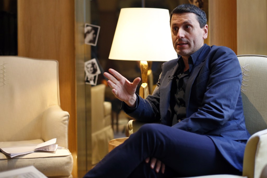 French writer Frederic Martel gives an interview about his explosive new book, "In the Closet of the Vatican," in Paris on Friday.