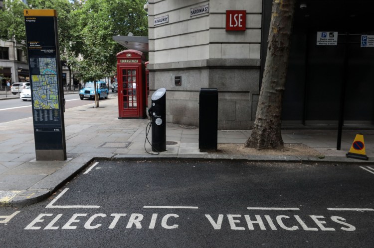 A parking area for electric vehicles in London. About half of existing public chargers are concentrated in China, by far the top electric vehicle market.
