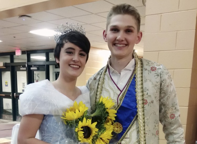 Simon Roussel, right, earned the lead in the Gorham High school play, Cinderella – played by Sierra Cummings, left. It's just part of a schedule that keeps the Gorham track and field athlete on the move.