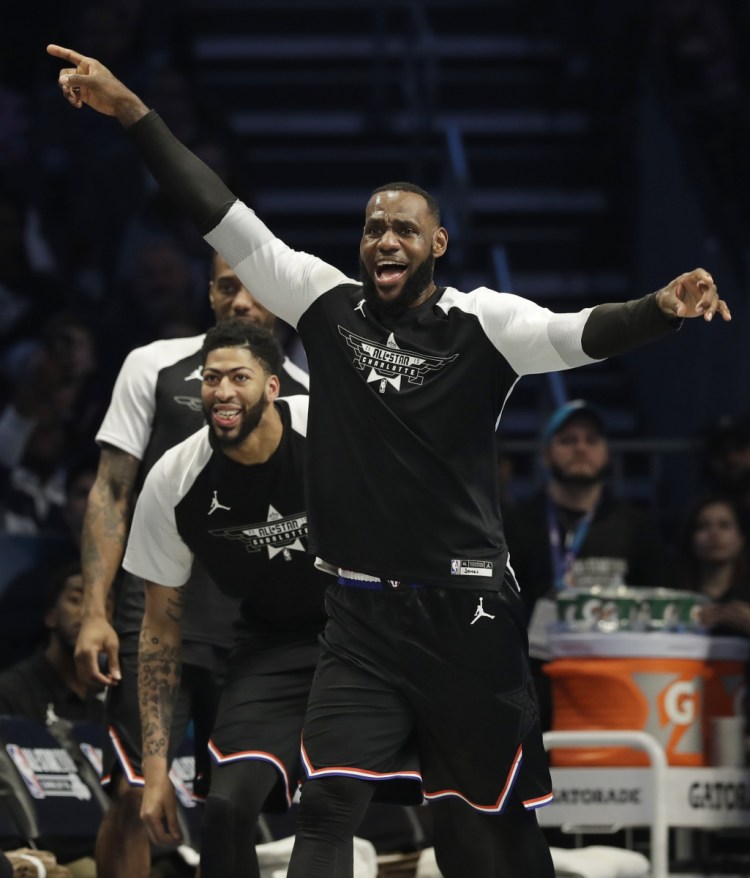 Team LeBron's LeBron James, of the Cleveland Cavaliers celebrates a basket against Team Giannis during the second half of the NBA All-Star on Sunday in Charlotte, N.C.