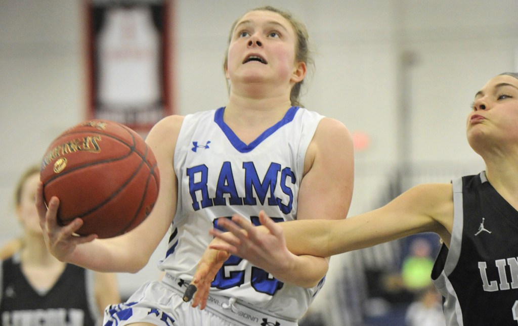 Emily Archibald is fouled on a drive in the lane during Kennebunk's 51-33 victory in a Class A South quarterfinal Monday at the Portland Expo. Archibald scored a team-high 17 points for the Rams.