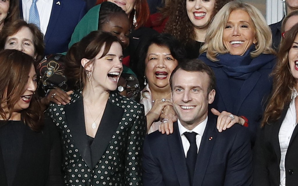 French President Emmanuel Macron and British actress Emma Watson, left, meet at the Elysee Palace in Paris on Tuesday. Macron said he wants gender equality to be a main focus of G-7.