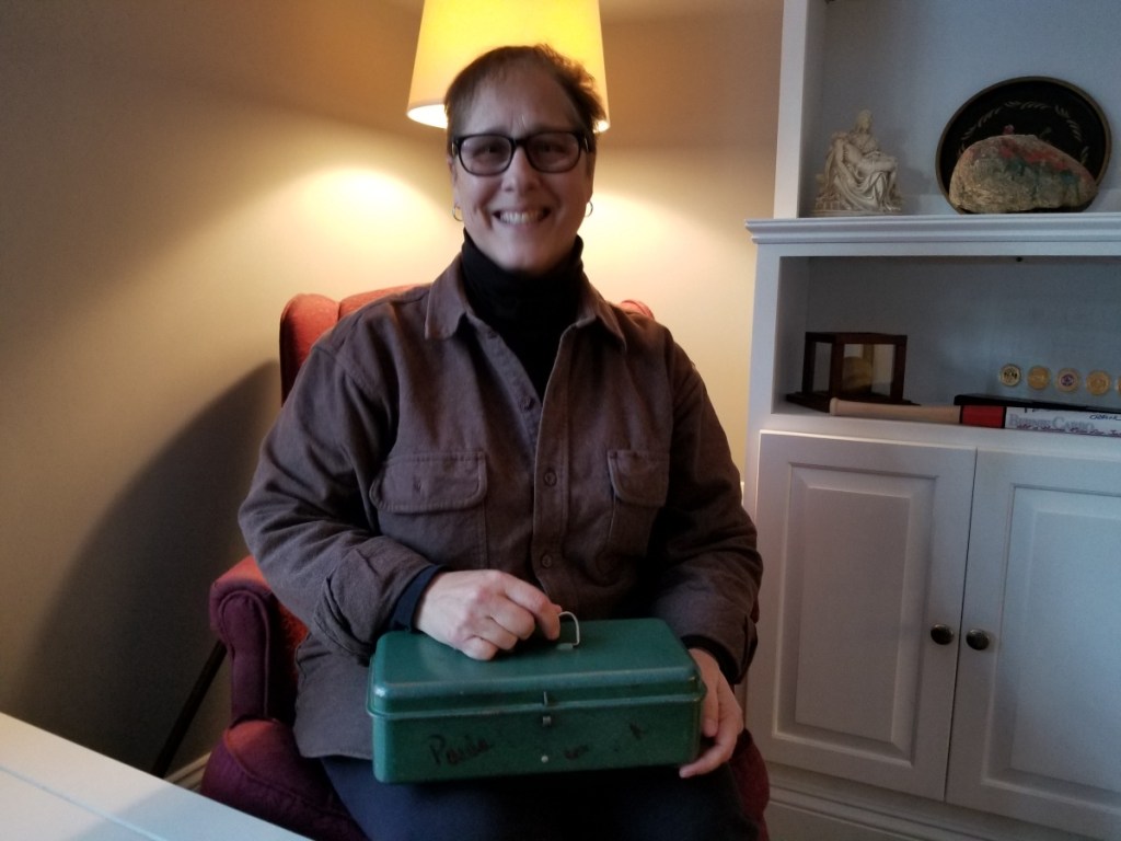 Paula Currie-Raymond with Mémère's green box.
