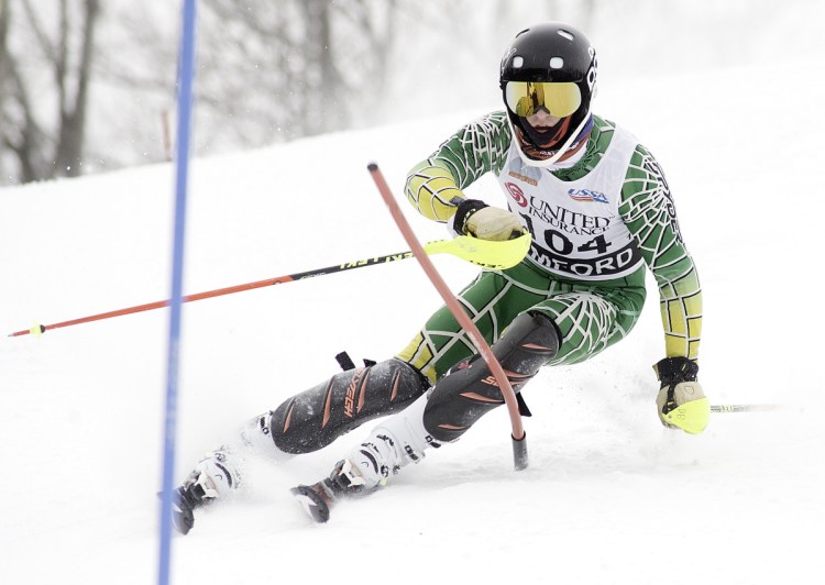 Killian Lathrop of Cape Elizabeth goes around a gate during his second run in the Class B slalom Wednesday at Black Mountain in Rumford. Lathrop won the event for the second straight year.