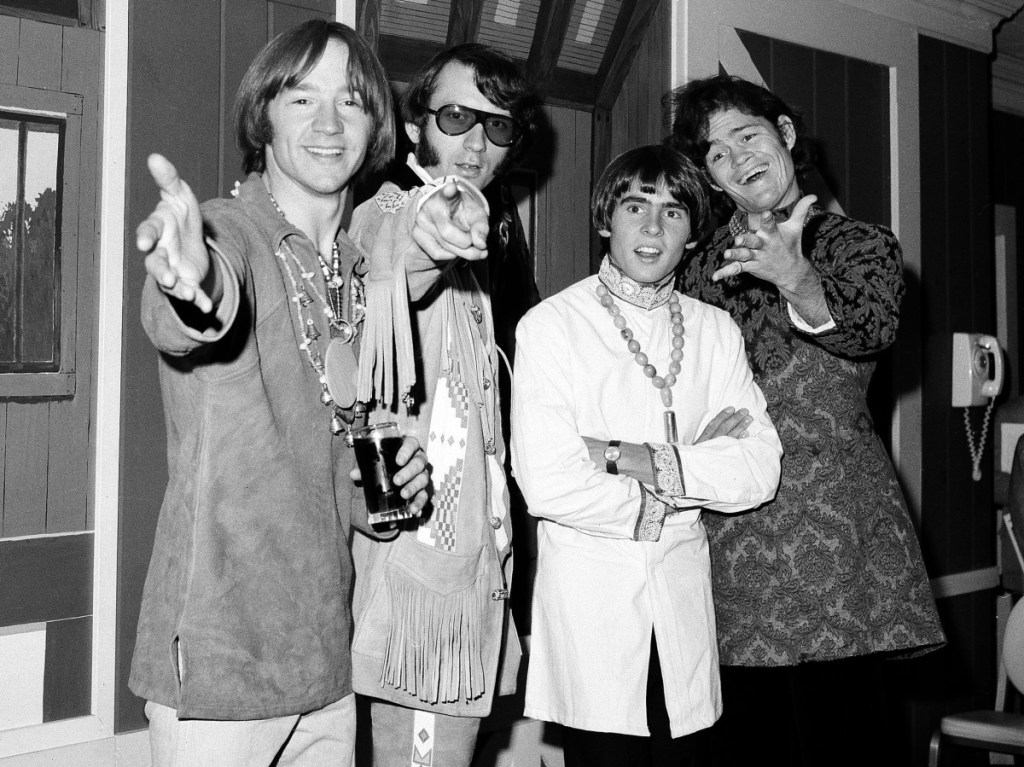 The Monkees – from left, Peter Tork, Mike Nesmith, David Jones and Micky Dolenz – appear at a news conference in New York in 1967. Tork, who played the clueless bass-guitarist in the made-for-television rock band, died Thursday.