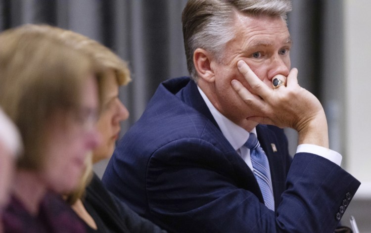 Mark Harris, Republican candidate in North Carolina's 9th Congressional race, listens to testimony during the third day of a public evidentiary hearing on the 9th Congressional District voting irregularities investigation Wednesday at the North Carolina State Bar in Raleigh, N.C. Harris on Thursday said a new election is warranted.