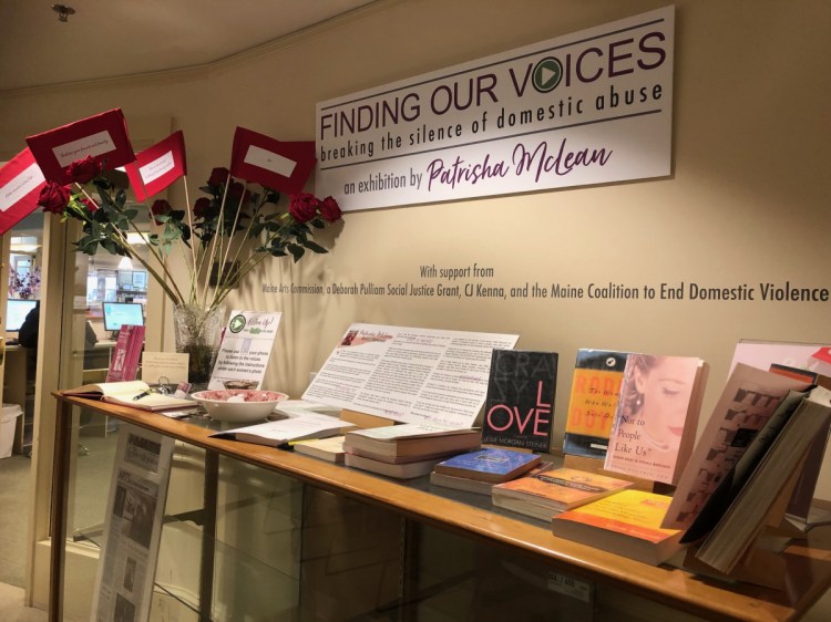 The exhibit includes "Red Flags" placed among long-stemmed red roses to alert girls and women to keep their eyes open amid the trappings of romance. Sue White, a seamstress in Camden, sewed the red flags. Each flag has a relationship warning such as "Lies," "Isolates you," "Has no friends and is estranged from family members" and "Sweeps you off your feet."
