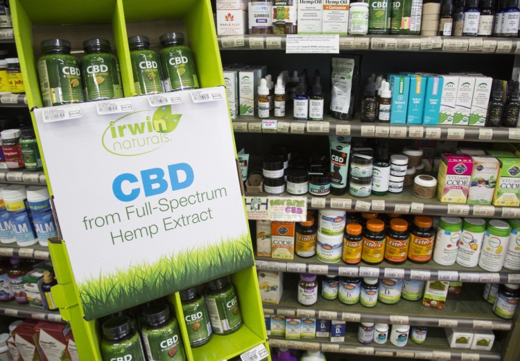 Products with hemp-derived cannabidiol are sold at Morning Glory Natural Foods in Brunswick. The store passed a state inspection Thursday, but manager Toby Tarpinian said: "It's confusing, what's allowed and what's not."