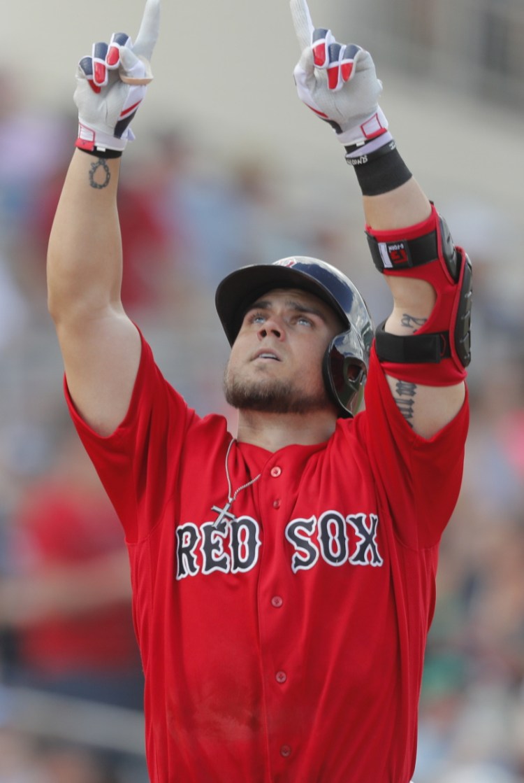 Boston's Michael Chavis celebrates after his three-run homer in the third inning Saturday against the Yankees.