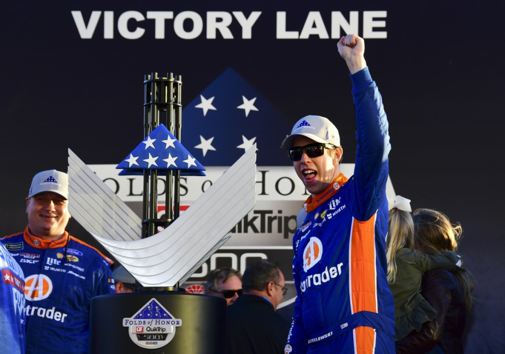 Brad Keselowski, right, celebrates in Victory Lane after winning the NASCAR Cup Series race Sunday at Atlanta Motor Speedway in Hampton, Ga.
Keselowski overcame a stomach virus to capture his 60th Team Penske victory.
