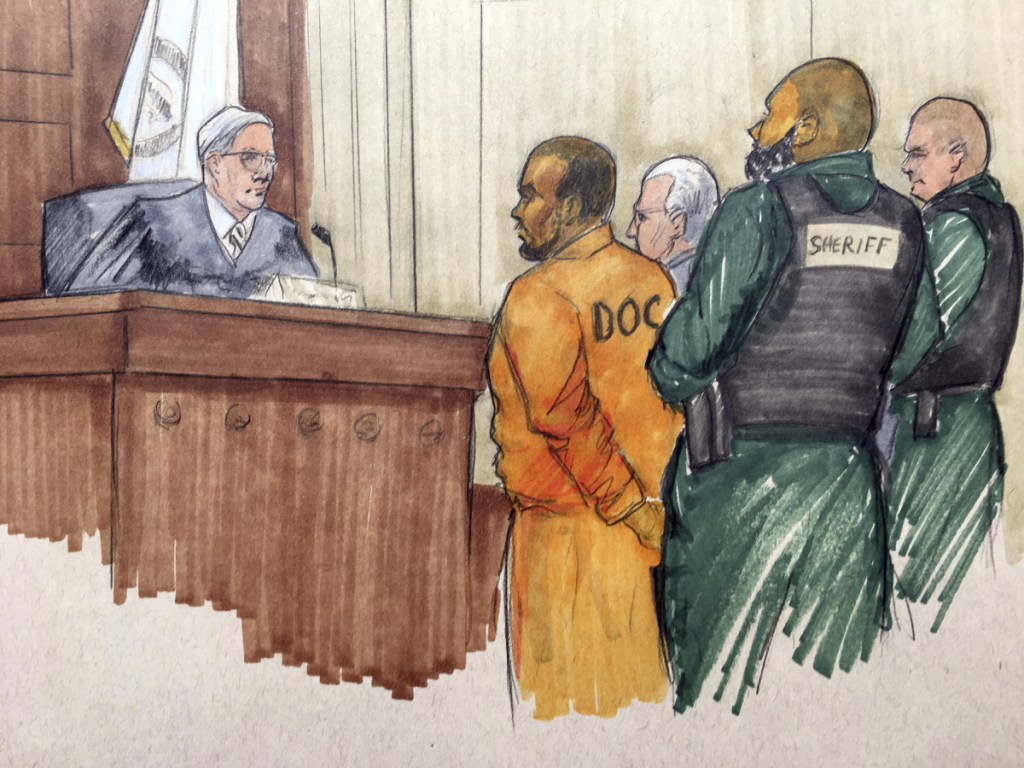 In this courtroom sketch, R&B singer R. Kelly appears before Cook County Associate Judge Lawrence Flood with his attorney Steve Greenberg on Monday at the Leighton Criminal Courthouse in Chicago. Kelly's attorney entered not guilty pleas on the singer's behalf after Kelly was charged with sexually abusing four victims dating back to 1998, including three underage teenagers.