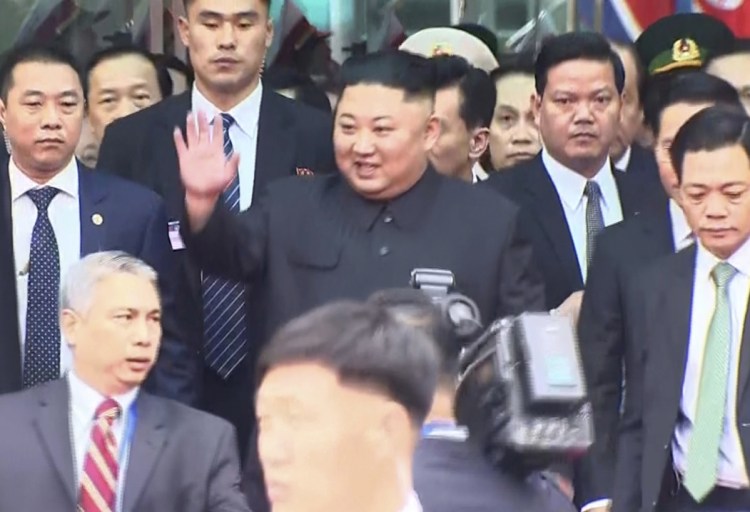 In this image from video, North Korean leader Kim Jong Un waves on his arrival in the border town of Dong Dang, Vietnam, on Tuesday before his second summit with President Trump.