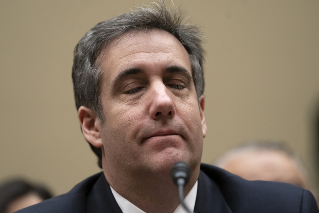 Michael Cohen, President Trump's former lawyer, testifies before the House Oversight and Reform Committee on Capitol Hill on Wednesday in Washington.