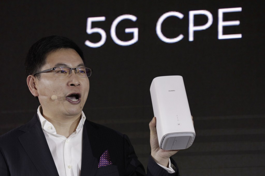 Richard Yu, CEO of the Huawei consumer business group, speaks as he unveils the wireless router running with 5G modem Balong 5000 chipset in Beijing.