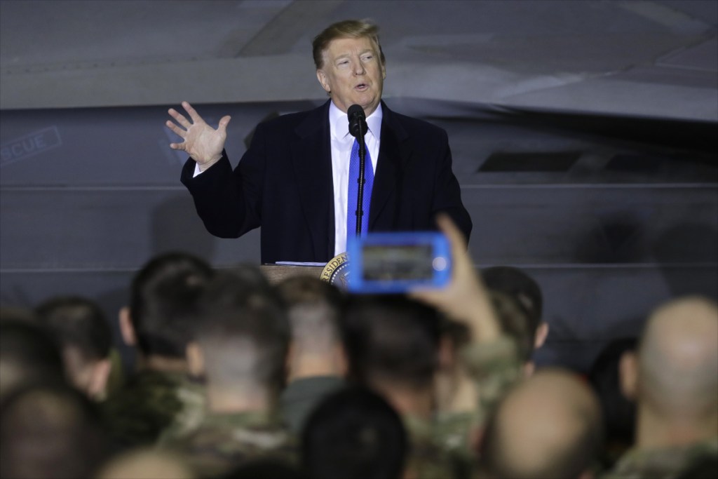 President Trump speaks to service members at Joint Base Elmendorf-Richardson in Anchorage, Alaska, during a refueling stop Thursday as he returned from Hanoi, Vietnam.