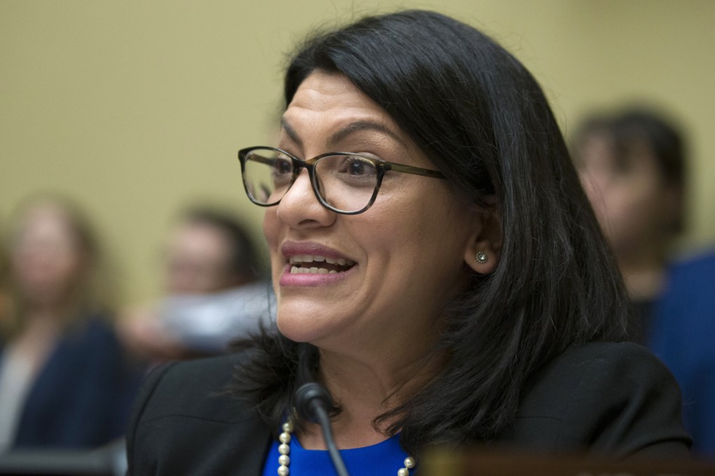 Rep. Rashida Tlaib, D-Mich., questions Michael Cohen, President Trump's former lawyer, as he testifies Wednesday before the House Oversight and Reform Committee on Capitol Hill in Washington.