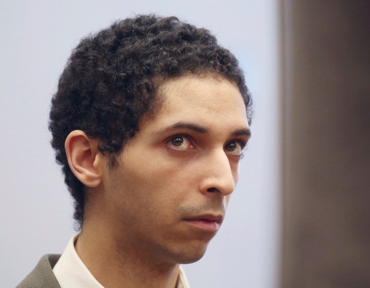 In this May 22, 2018, file photo, Tyler Barriss, of California, appears for a preliminary hearing in Wichita, Kan. The California man is asking the judge for a 20-year prison sentence for making a hoax call that led police to fatally shoot a Kansas man following a dispute between online gamers. His attorney argued in a motion Barriss never intended for anyone to get hurt and his conduct was an outgrowth of the culture within the gaming community. 