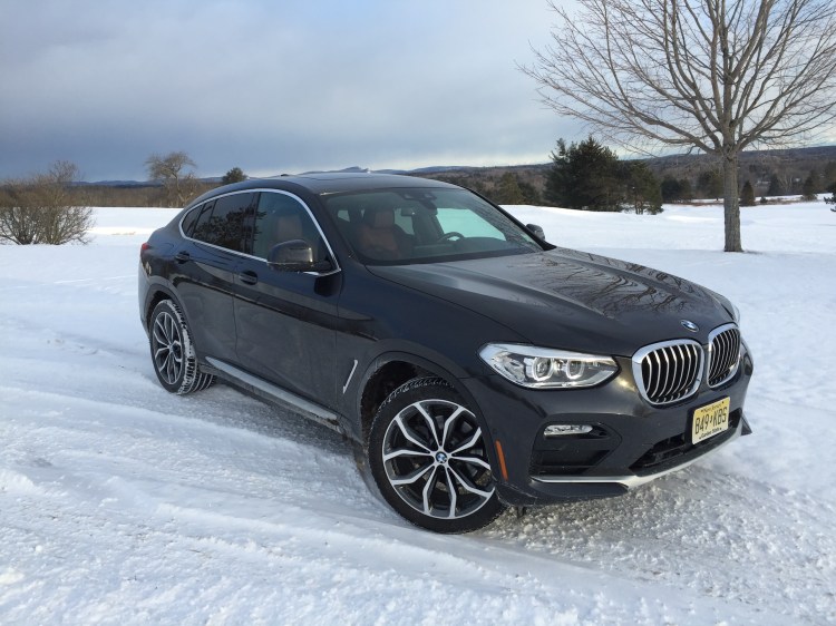 The xDrive30i's pricing starts at $51,445, including destination fee. Photo by Tim Plouff. Location: Penobscot Valley Country Club, Orono. 