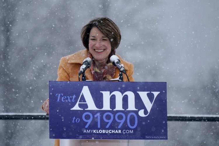 Sen. Amy Klobuchar greets the crowd before announcing her bid for president at Boom Island Park in Minneapolis on Sunday.