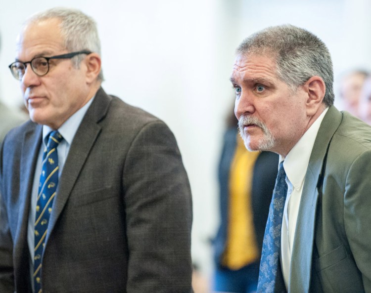 James E. "Ted" Sweeney, right, and his attorney, Walter Hanstein, stand as Justice William Stokes enters Franklin County Superior Court in Farmington on Friday morning, when Sweeney was found guilty of murder.  