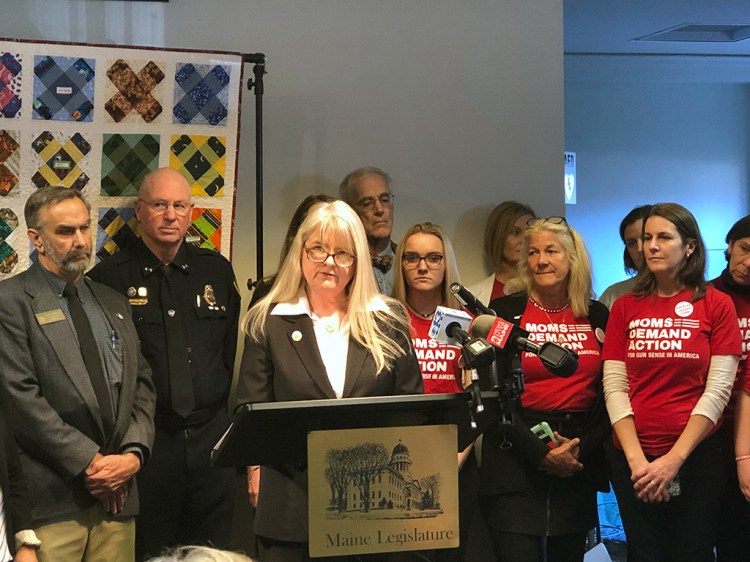 Sen. Rebecca Millett, D-Cape Elizabeth, addresses supporters of a new "red flag" bill that she is sponsoring, during a press conference Tuesday at the State House. 