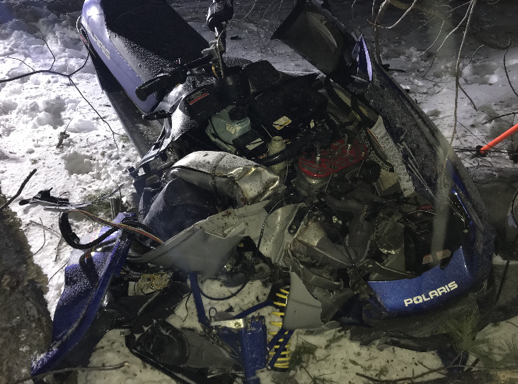 The wrecked 2002 Polaris 700 snowmobile after a fatal crash on Wilson Pond.