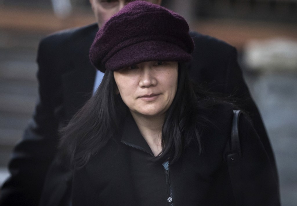 Huawei chief financial officer Meng Wanzhou leaves her home to attend a court appearance in Vancouver, British Columbia, on Jan. 29. Canada said Friday it will allow the U.S. extradition case against Meng to proceed. She is due in court on March 6, at which time a date for her extradition hearing will be set. Meng is wanted in the U.S. on fraud charges that she misled banks about the company's business dealings in Iran.