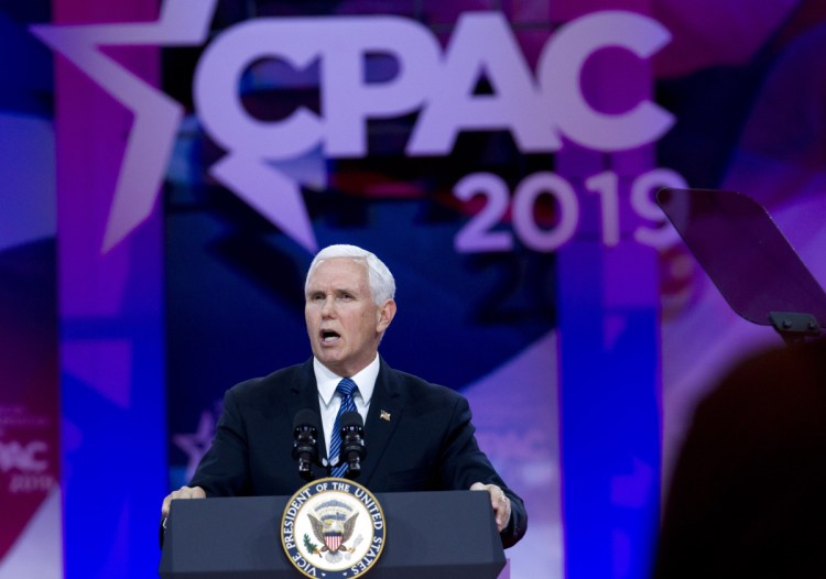 Vice President Mike Pence speaks at the Conservative Political Action Conference in Oxon Hill, Md., on Friday. "The moment America becomes a socialist country is the moment America ceases to be America," he told the crowd of conservative activists.