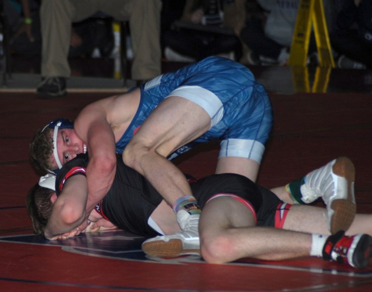 Portland's Zack Elowitch controls Winchester's Patrick Doherty in his opening match at the New England Interscholastic Wrestling Championships on Friday night in Providence. Elowitch will compete in
the 160-pound quarterfinals on Saturday morning after beating Doherty by major decision.