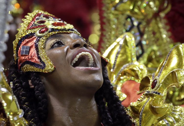 A dancer from the Academicos do Tatuape samba school performs during a carnival parade in Sao Paulo, Brazil, on Saturday.