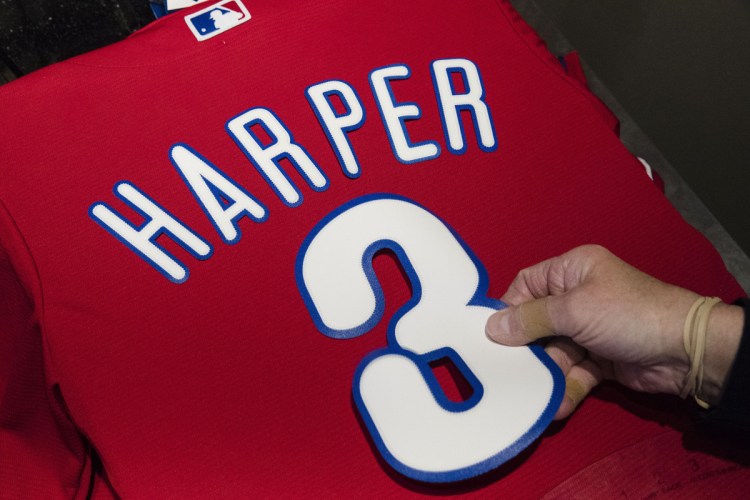 The number is 3, not 34, and the uniform is the Philadelphia Phillies, not the Washington Nationals. Fans are buying the jerseys at a record pace.
