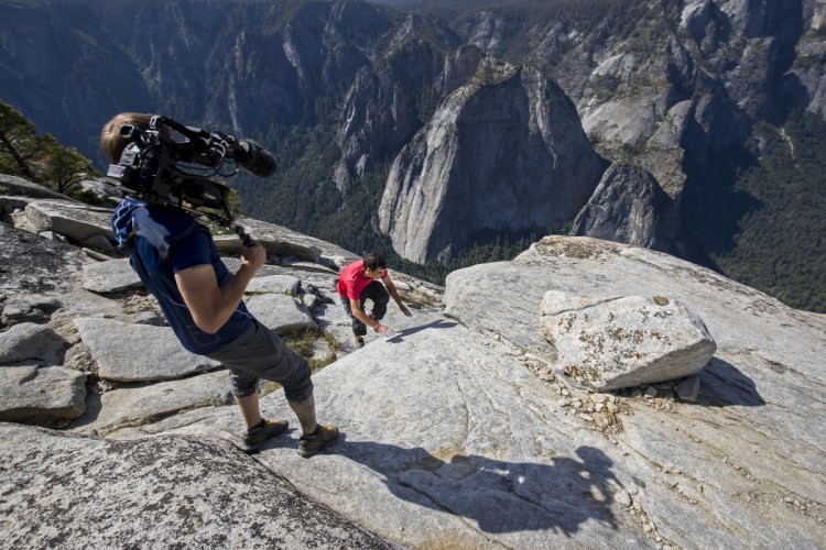 Maine native Clair Popkin films pro climber Alex Honnold clambering to the top of El Capitan using no ropes or other protective equipment.