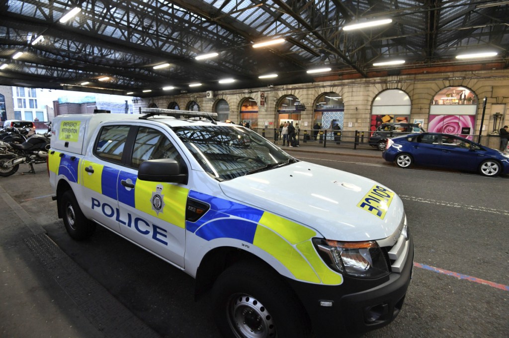 A British Transport Police vehicle is seen at Waterloo Railway Station on Tuesday after three small improvised explosive devices were found at buildings at Heathrow Airport, London City Airport and Waterloo in London.