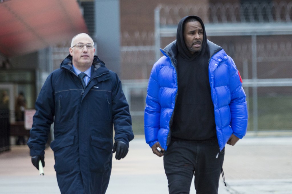 R. Kelly leaves Cook County Jail in February with his defense attorney, Steve Greenberg, after posting $100,000 bail. He was taken back into custody on Wednesday. In his first interview since being charged with sexually abusing four people, including three underage girls, R. Kelly says he "didn't do this stuff" and he's "fighting for his life.
