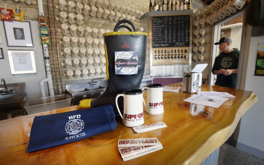 Berwick's Corner Point Brewing Co. has a boot on the bar for donations to the Berwick Fire Department, which lost 32-year-old paramedic Joel Barnes to a fire Friday.