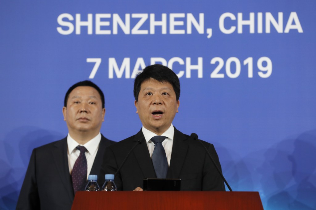 Huawei Rotating Chairman Guo Ping, center, appeared at a press conference Thursday in Shenzhen, China, as the company launched a lawsuit in Plano, Texas, the headquarters of Huawei's U.S. operations. Guo said the company was "compelled to take this legal action" to protect its position in the global marketplace.
Associated Press/Kin Cheung