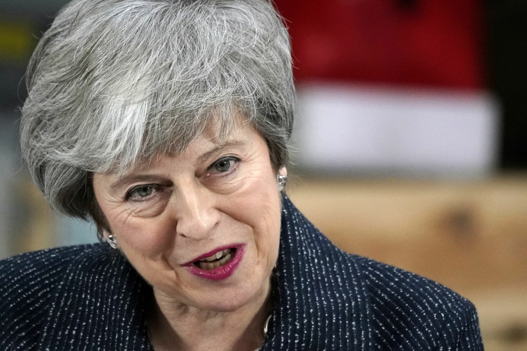 British Prime Minister Theresa May gives a speech Friday in Grimsby, Britain. Battling to stave off a second defeat for the unpopular Brexit deal, May also implored the EU to help her make "one more push" to get her agreement through a skeptical British Parliament.