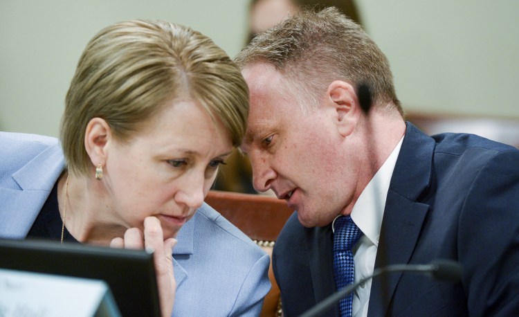 Rep. Craig Hall, R-West Valley City, confers with Rep. Karianne Lisonbee, who chairs the House Judiciary Committee, in Salt Lake City on Tuesday. Hall watched lawmakers dismantle his bill to end conversion therapy and replace it with an alternative that he says would do nothing to stop the widely discredited practice.